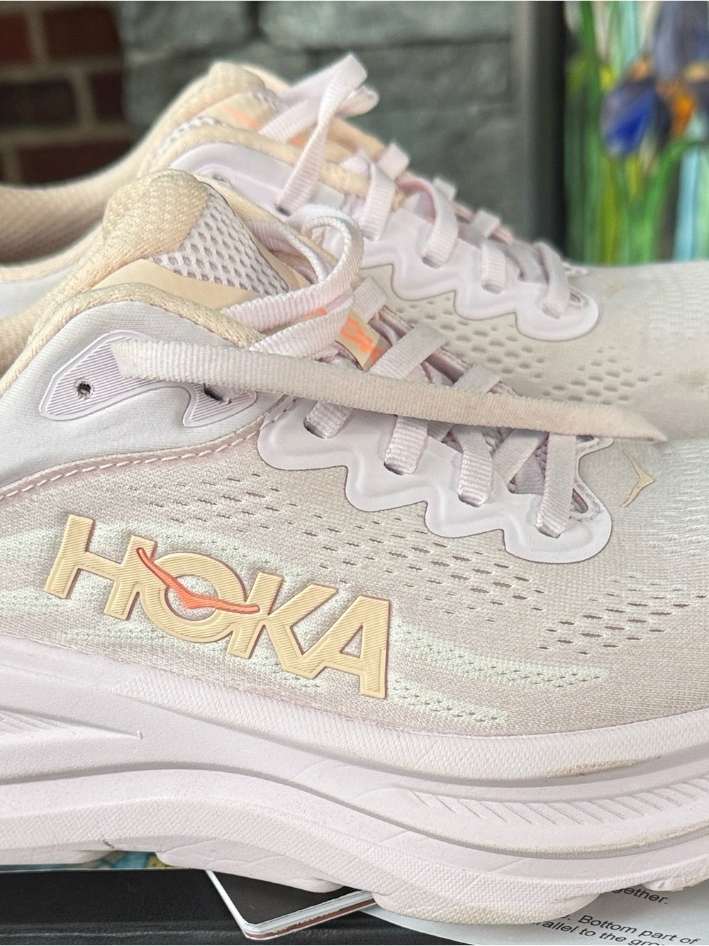 Hoka Women's Light Pink Running Shoes with Peach Accents